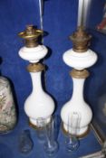 A pair of early 20th Century oil lamps, with white glass bases -2