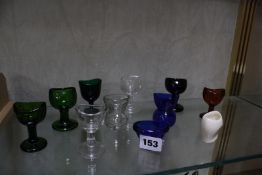 A collection of assorted glass eye baths and one ceramic bath -11