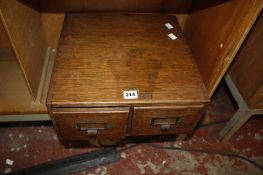 A 20th Century oak two drawer filing chest, 38.5cm wide Best Bid