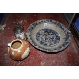 An Oriental charger, with crackle glaze, 39cm in diameter (AF) a delft style tankard and a slip-