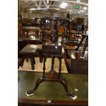 A George III mahogany tripod shaving stand 80cm high