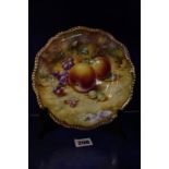 A Royal Worcester cabinet plate, gilt rim with hand painted fruit, signed S.Wood, 20cm