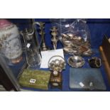 A collection of silver plate, including a silver plate mounted and etched glass claret jug, a pair