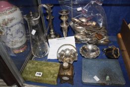 A collection of silver plate, including a silver plate mounted and etched glass claret jug, a pair