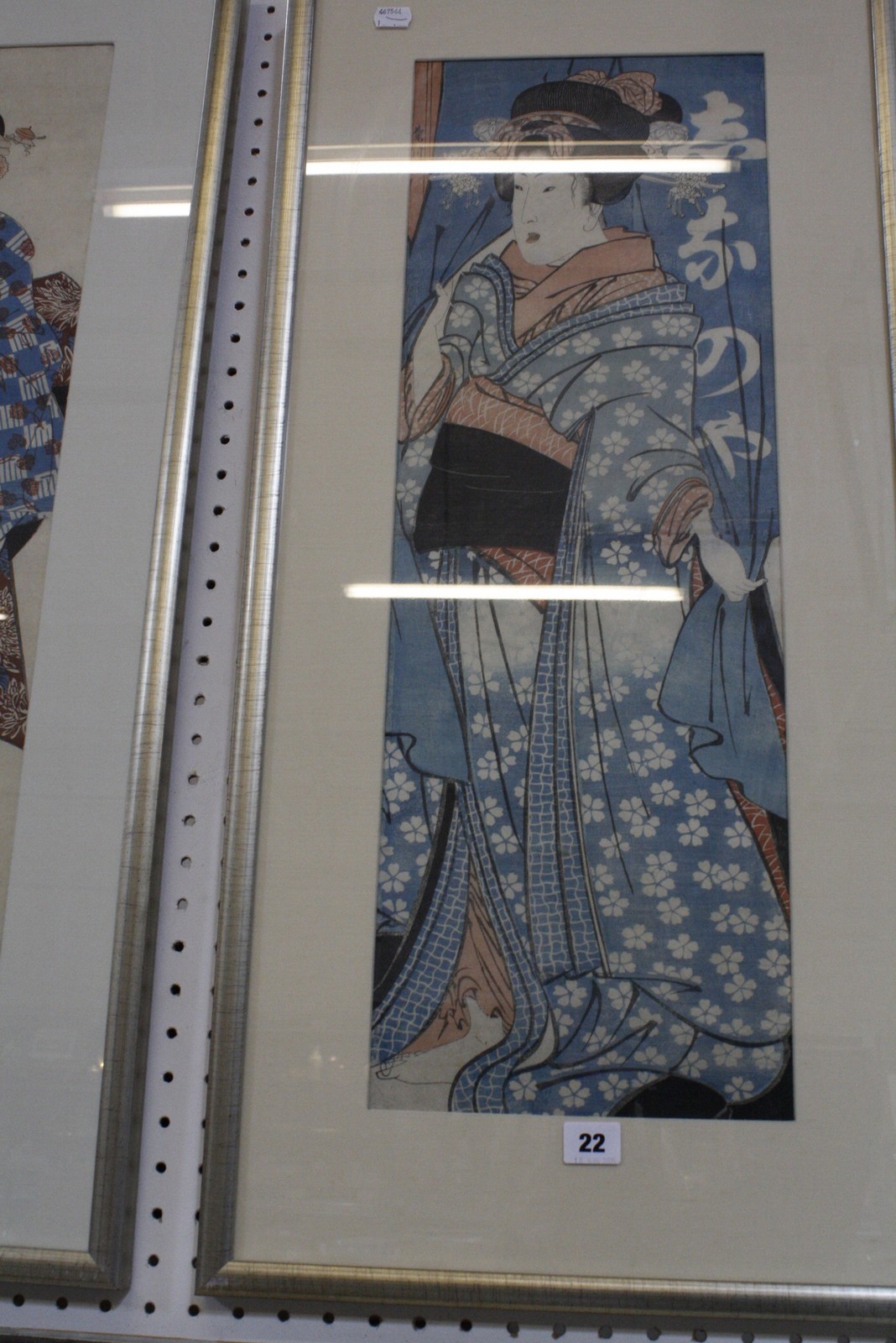 Kikukawa Eizan (Japanese, 1787-1867) Geishas A pair woodblock prints 68.5cm x 23.5cm