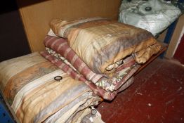 A quantity of assorted curtains and fabric