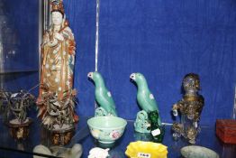 A Japanese Satsuma style figure (a.f.), a Chinese Blanc De Chine figure, two Oriental style parrots,