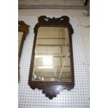 A George III mahogany fretwork mirror 108cm high, 56cm wide