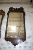 A George III mahogany fretwork mirror 108cm high, 56cm wide