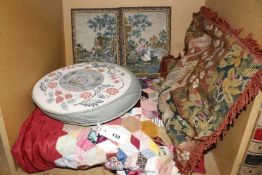 A patchwork quilt, a tapestry cushion dated 1888, another tapestry cushion and a writing set cover