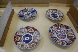Four assorted Japanese Imari plates, the largest 24cm in diameter