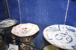 Two Chinese 18th Century plates, one with blue border decorated with figures, the other with pink