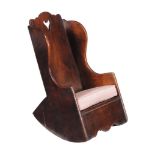A mahogany child's rocking chair , first quater 19th century  A mahogany child's rocking chair  ,