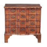 A Dutch hardwood serpentine fronted chest of drawers, second half 18th century  A Dutch hardwood