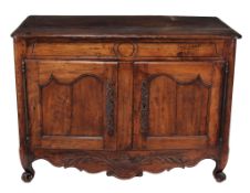 A French oak side cabinet , 18th century, the top with moulded edge above a...  A French oak side