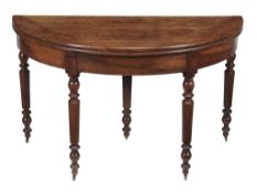 A Continental walnut folding dining table , late 18th/early 19th century  A Continental walnut
