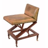 A Victorian mahogany and studded leather upholstered adjustable stool  A Victorian mahogany and