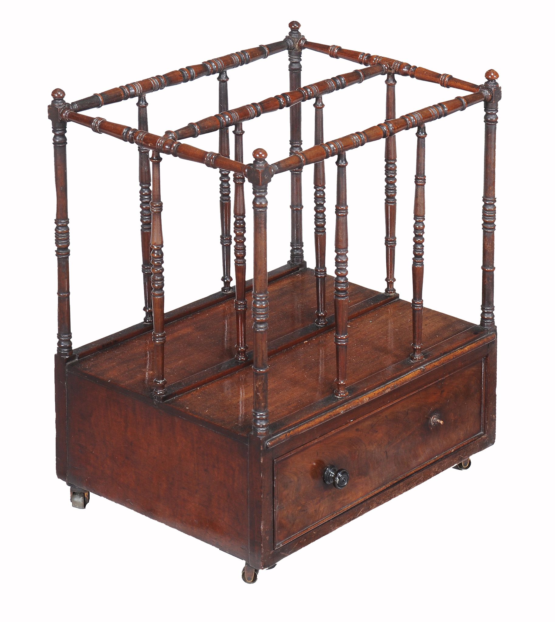 An early Victorian mahogany canterbury, circa 1840  An early Victorian mahogany canterbury,