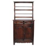 A French oak bookcase cabinet , 18th century and later  A French oak bookcase cabinet  , 18th