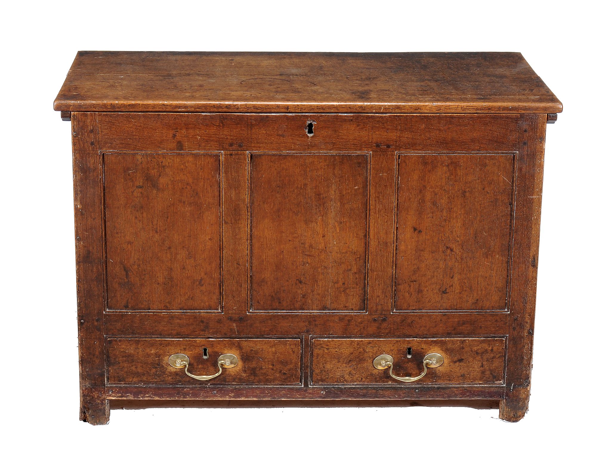 A George III oak mule chest, circa 1770, the lift top opening to large...  A George III oak mule