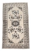 A woven rug, Chinese or Tibetan, approximately 154 x 78cm  A woven rug, Chinese or Tibetan,