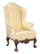 An upholstered and mahogany armchair, in the George III style  An upholstered and mahogany armchair,