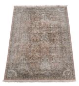 A Persian silk carpet , Goume, depicting the showing the Four Seasons  A Persian silk carpet ,