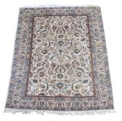 A Tabriz carpet , approximately 306 x 198cm  A Tabriz carpet ,   approximately 306 x 198cm