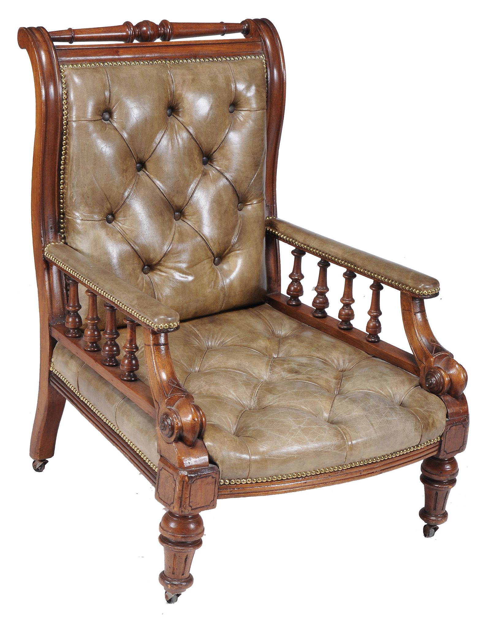 A Victorian mahogany and leather upholstered library chair , circa 1860  A Victorian mahogany and