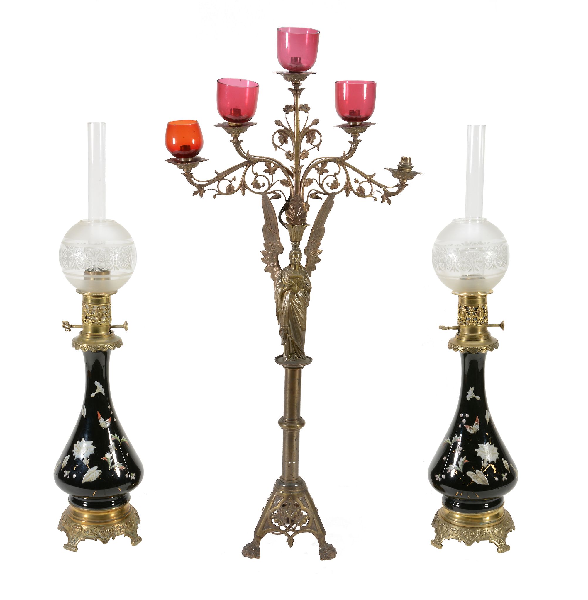 A pair of Continental porcelain and gilt metal mounted table oil lamps  A pair of Continental