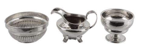 A George III silver circular bowl, maker's mark W .., London 1793, half reeded, on a collet foot,
