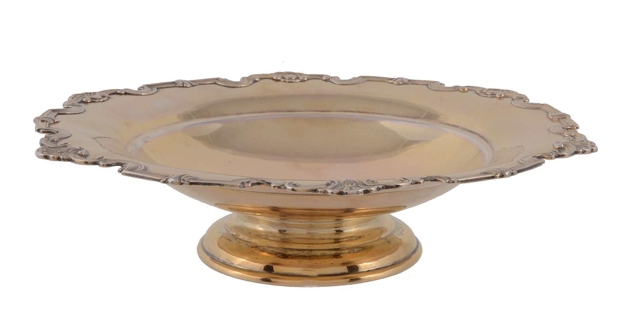 A silver gilt shaped circular fruit stand by Mappin & Webb, Sheffield 1961, with a shell and scroll