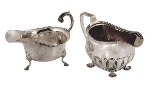 A George III silver oblong cream jug, maker's mark IW? (poorly struck), London 1814, with a reeded
