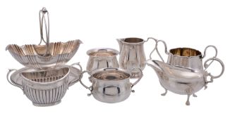 A collection of small silver, including: a late Victorian navette pedestal and lobed sugar basket