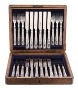 A set of twelve late Victorian silver dessert knives and forks by The Goldsmiths & Silversmiths Co.