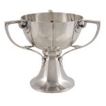 An Arts and Crafts silver pedestal bowl by William Aitken, Birmingham 1906, the circular bowl