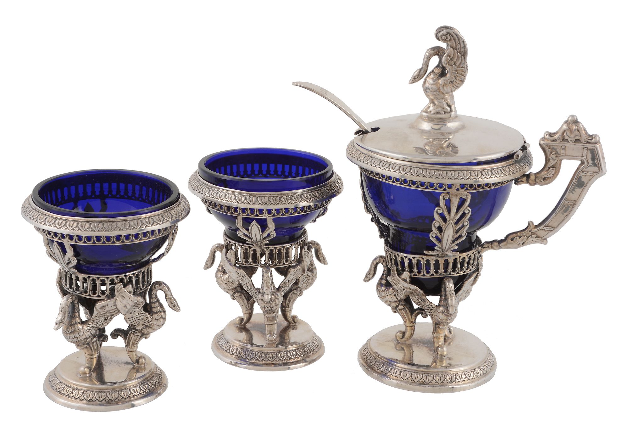 A Dutch or German silver three piece cruet set, Hanau style pseudo marks, comprising: a pedestal