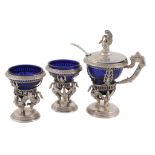 A Dutch or German silver three piece cruet set, Hanau style pseudo marks, comprising: a pedestal