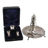 A collection of small silver, comprising: a George III fiddle pattern shell bowl caddy spoon by