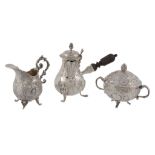 A matched German and Dutch silver three piece small coffee service, variously marked, circa 1900,