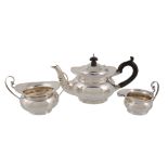 A matched Edwardian silver small three piece tea service by Edward Barnard & Sons, London 1902 &
