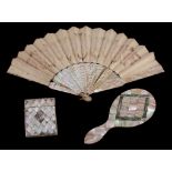 A Victorian mother of pearl and abalone lozenge veneered hand mirror, 22.5cm (8 3/4in) long; a