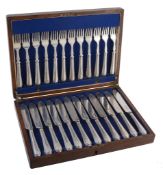A cased set of twelve Victorian silver beaded fish knives and forks, Sheffield 1880, engraved D,