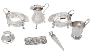 A collection of silver items, to include: a pair of oval sauce boats by Edward Barnard & Sons Ltd.,