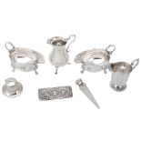 A collection of silver items, to include: a pair of oval sauce boats by Edward Barnard & Sons Ltd.,