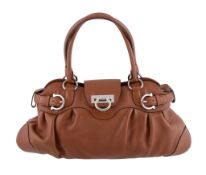 Salvatore Ferragamo, a brown leather handbag, with chrome trim, and internal zip pocket, 42cm wide