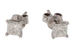 A pair of princess cut diamond ear studs, the diamonds estimated to weigh 1.16carats total, both