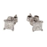 A pair of princess cut diamond ear studs, the diamonds estimated to weigh 1.16carats total, both