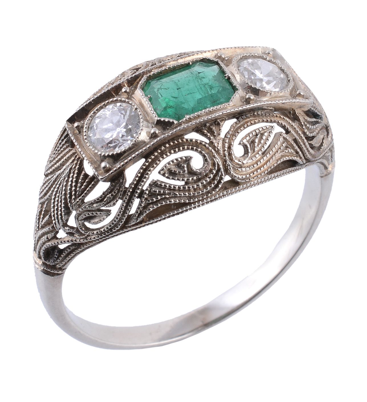 An emerald and diamond ring, the central rectangular shaped emerald in a collet setting between two