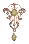 A peridot and seed pearl pendant/brooch, the rectangular shaped peridot claw set within a foliate